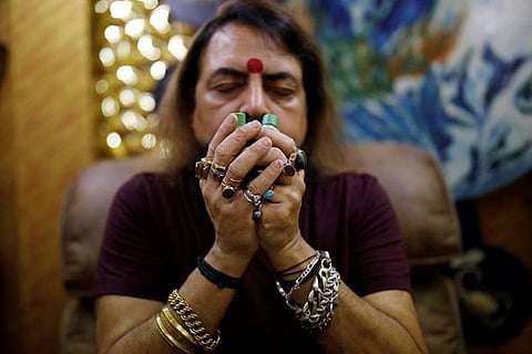 Indians seek out fortune tellers to fight COVID-19 blues