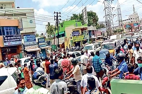Parents block Avinashi Road in Tirupur on Friday protesting the admn activities in a govt school