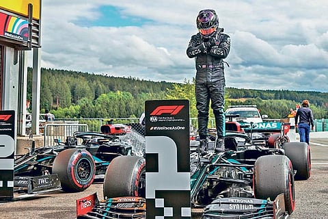 Hamilton takes pole in Belgium