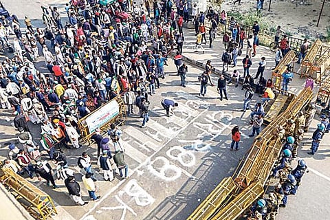 BKU members protest after police imposed Section 144 at Ghazipur border in New Delhi.