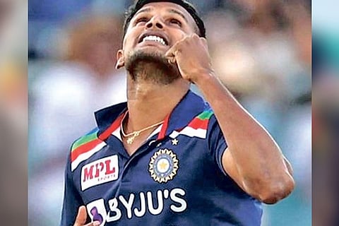 Thangarasu Natarajan celebrates after picking up his first international wicket.