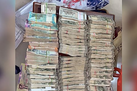 The unaccounted cash found in the house of TNPCB engineer Dhanaraj at Urappakkam near Chennai