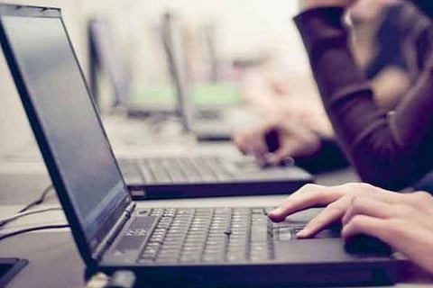 Pandemic cancels foreign trip, students get laptops instead