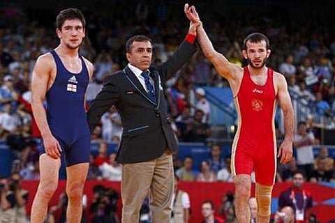 Russia claim four freestyle wrestling golds at Individual WC