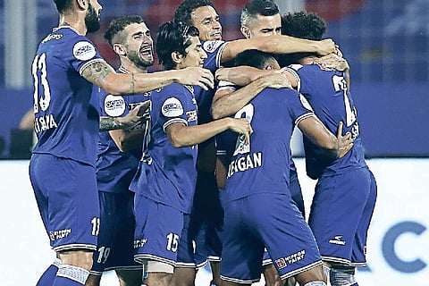 Chennaiyin FC players celebrate the opening goal against FC Goa.