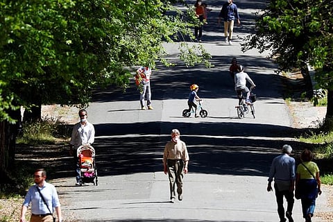 Slow road to normalcy: A return to living, working close together