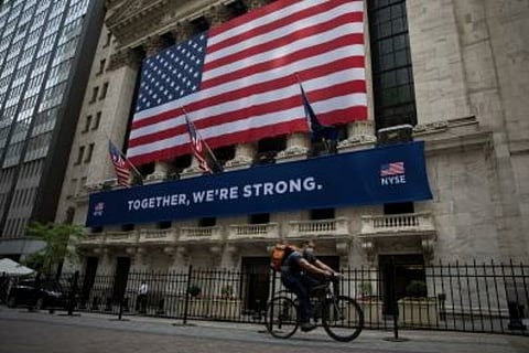 US weekly unemployment claims drop for 1st time in 3 weeks