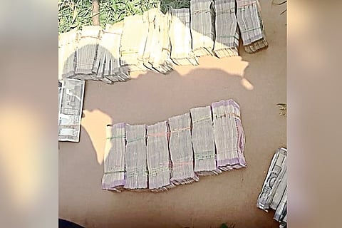The cash bundles recovered from relator?s car in Coimbatore on Sunday
