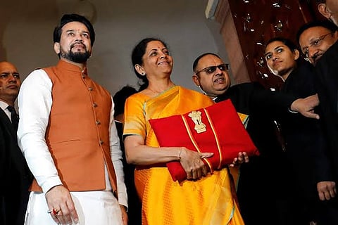 Finance Minister Nirmala Sitharaman with budget papers (Image courtesy: Reuters))