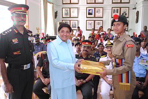 Lt Governor Kiran Bedi presenting mementos to NCC cadets in a reception hosted at Raj Nivas in Puducherry