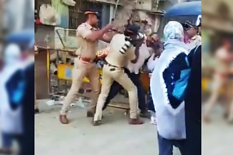 Mumbai cops accused of beating up photojournalist transferred