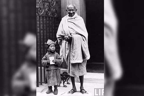 Did baby Dalai Lama photograph with Gandhi?