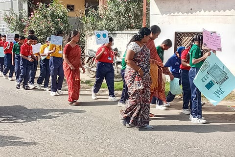Students take part in the e-waste collection drive; (below) representative image of used mobile phones