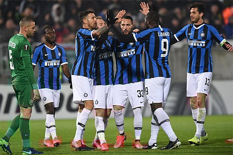 Milan players celebrate their victory over Ludogorets