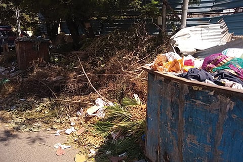 Conservancy workers only remove garbage dumped inside two bins at the locality, leaving the garden waste