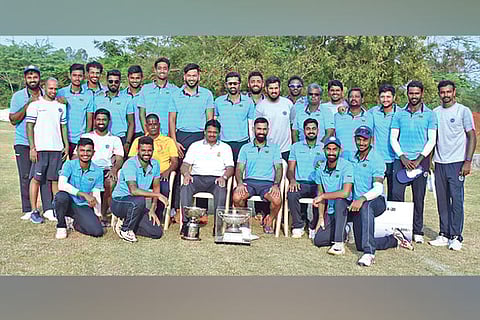 The Vijay CC players and support staff are all smiles after their triumph in the One-Day competition