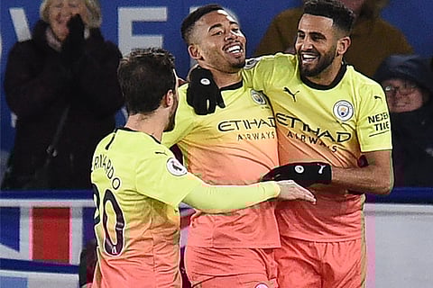 Riyad Mahrez (right) set up the winner for Gabriel Jesus (centre)