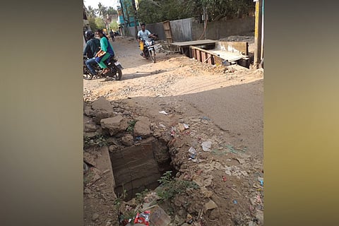 An uncovered pit at Balaji Nagar street in Anakaputhur, poses danger to the residents of the locality
