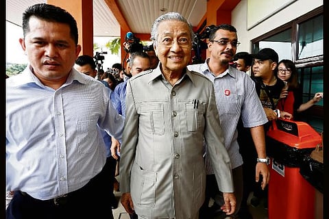 Malaysia's Mahathir proposes 'unity government' to strengthen grip
