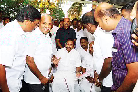 Poultry owners petition Chief Minister Edappadi K Palaniswami in Namakkal on Tuesday
