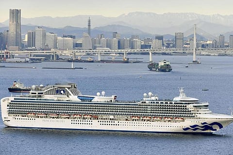Dozens allowed off Japan virus-hit ship have 'symptoms': Minister