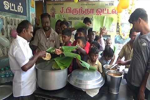 Jayashanker serving parottas at Re 1 each to his customers on Wednesday