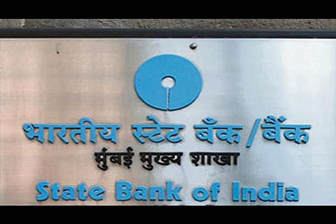 SBI invites bids to sell its 1 pc stake in NSE