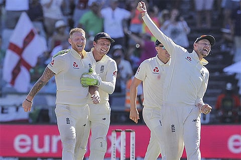 Ben Stokes (left) and captain Joe Root (right) celebrate after England?s victory
