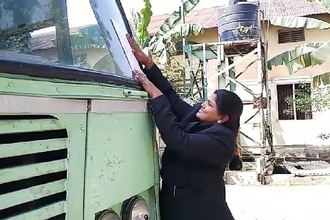 Officials attaching STC bus