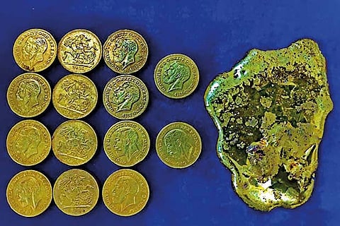 Gold coins and paste retrieved from the fliers on Thursday night