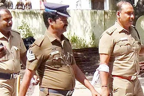 Aruppukkottai Deputy Superintendent of Police G Venkatesan, who was injured on his right arm during a tussle