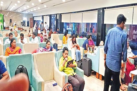 Scores of rail passengers take their time relaxing at the ?Executive Lounge? at Madurai Railway Junction