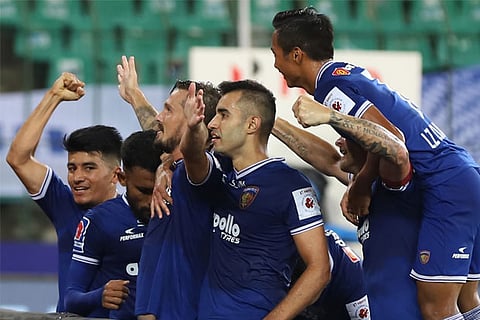 Chennaiyin FC players celebrate after defeating NorthEast United 2-0