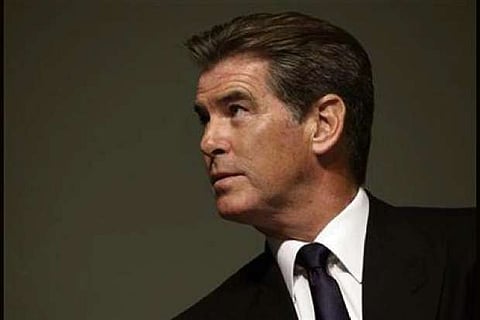 Pierce Brosnan, wife step out for a musical