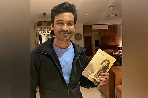 Dhanush poses with Ravi Rai?s The Tattoo On My Breast