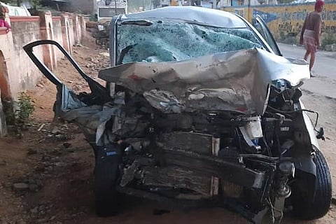 The mangled remains of the car involved in the accident, near Rajapalayam on Tuesday