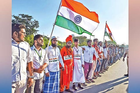 Protesters stand hand-in-hand on Anna Salai-GST Road stretch to oppose CAA and NRC on Thursday