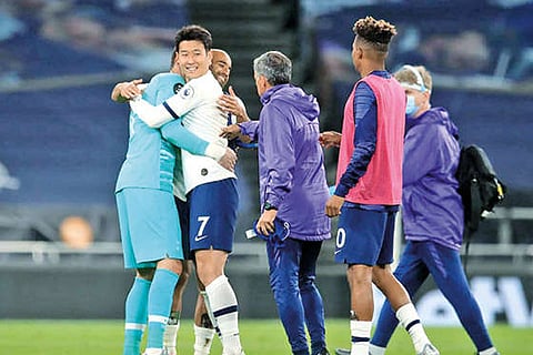 Tottenham Hotspur players celebrate their win over Everton