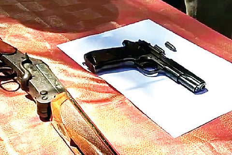 The single barrel breech loading gun and the pistol that were seized