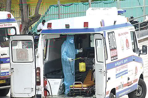 An ambulance being sanitised outside RGGGH in Chennai
