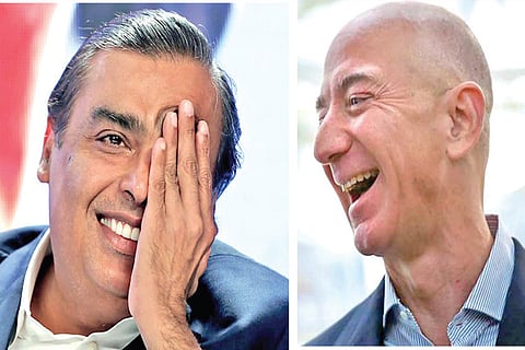 Mukesh Ambani, Jeff Bezos (file pic)