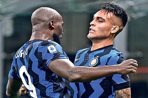 Lautaro Martinez (right) celebrates his goal with Romelu Lukaku