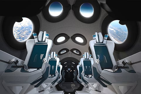 A computer rendering shows the seat configuration for the SpaceShipTwo passenger cabin