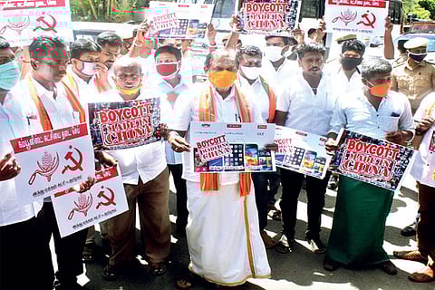 Members of HMK stage a protest demanding boycott of Chinese products in Tirupur on Friday
