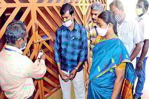 Officials seal the school in Coimbatore on Tuesday