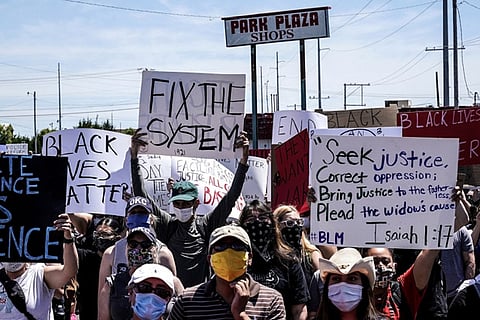 Confederate monument in Virginia covered with trash bags