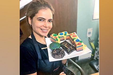 Alisha Abdullah with different types of soaps she has made