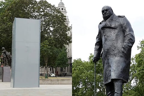 A statue of Winston Churchill covered up outside the parliament in London