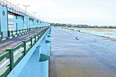 Cauvery flowing through Mukkombu in Tiruchy on Monday