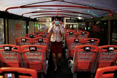 Taiwan to ease virus border controls to let in some business people